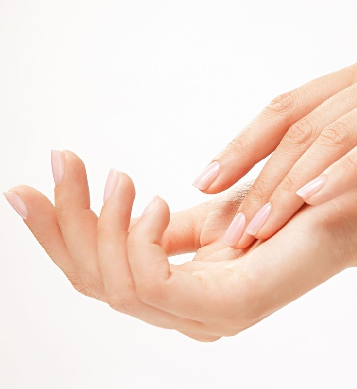Photo of a woman's beautiful hands and nails